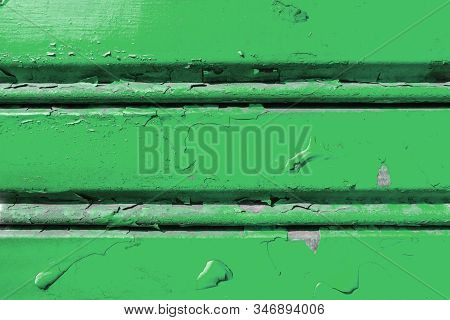 Background Of Old Metal Sheet With Peel Paint Texture Surface. Painted Metal Roller Shutters Door Wi