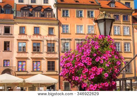 Warsaw, Poland, Flowers, Colorful Houses In Market Square In The Old Town Of Polish Capital