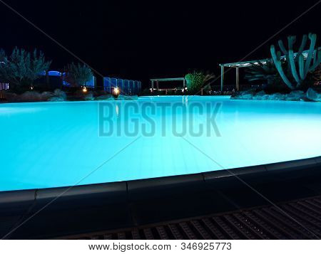 Sweeming Pool With Blue Light. Summer Night In Hugharda City, Egypt