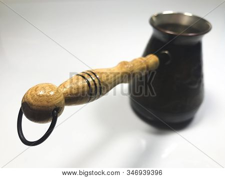 The Cezva On Grey Background. The Focus On The Handle