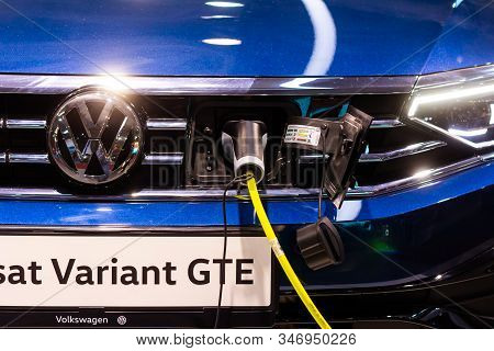 Charging An Plug-in Hybrid Volkswagen Passat Variant Gte With The Power Cable Supply Plugged In, Pra
