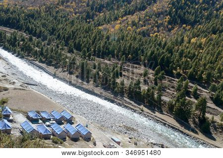 Ariel View River Stream Between Mountains With Pine Trees.top Down View Of Fast Moving Rapids River 
