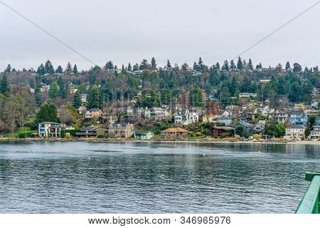 A View Of Home Along The Shore On Vashon Island In Washington State.