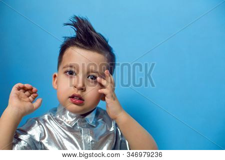 Child A Boy Of Three Years Old With A Fashionable Hairstyle