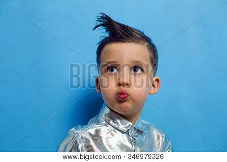 Child A Boy Of Three Years Old With A Fashionable Hairstyle