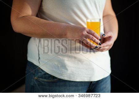 Food Calorific Value, Sugar Contain, Imbalanced Nutrition. Woman Drinking Orange Soda, Close Up