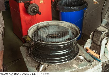 Inner Part Of A Car Tyre On A Table In A Garage