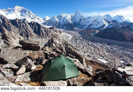 Tent In Himalayas Mountains. Mount Everest From Gokyo Peak And Ngozumba Glacier, Gokyo Valley, Nepal