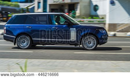 Fast Moving Suv Rides On A City Road. Premium Range Rover L405 Car On The Road In Motion. Overspeed 