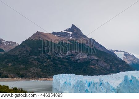 Large Mountain Near The Perito Moreno Glacier With A Lot Of Vegetation On It And With A Little View 