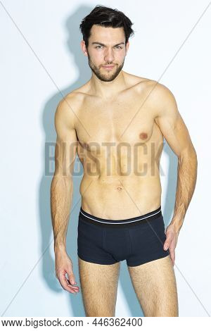 Caucasian Handsome Brunet Man In Black Underware In Good Phyisycal Fit While Posing In Underware Aga