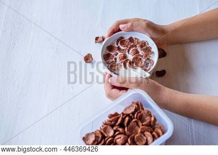 .breakfast Cereal With Fresh Milk On The White Table