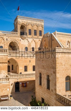 Famous Midyat Guest House in Midyat city, Mardin province, Turkey. Traditional architecture of the Midyat Konuk Evi building at sunny day.