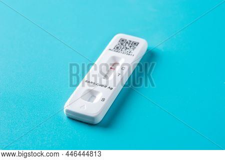 Covid-19 Rapid Antigen Test On Blue Background