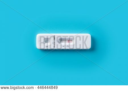 Covid-19 Rapid Antigen Test On Blue Background