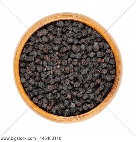 Dried Bilberries, European Blueberries, In A Wooden Bowl. Ripe And Raw Fruits Of Vaccinium Myrtillus