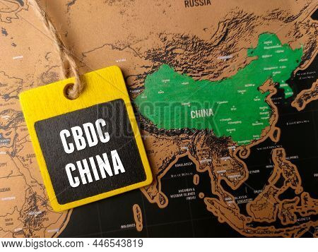 Top View Wooden Board With Text Cbdc China On A China Map Background.