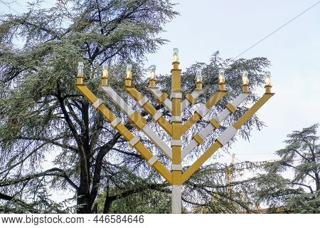 Hanukkah Menorah, Hanukkiah, Nine-branched Candelabrum Lit During. Jewish Holiday Of Hanukkah. Hanuk