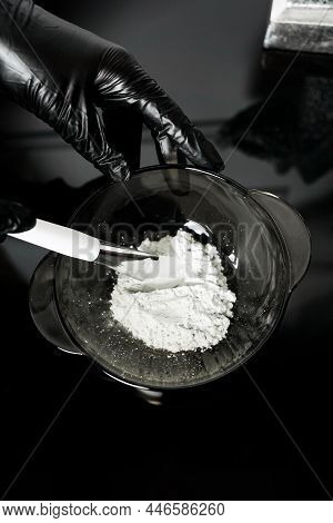 Female Hands In Medical Gloves Hold A Bowl Of White Powder. Kaolin Clay White Powder Cosmetic Grade 