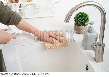 Woman Housewife Is Doing The Spring Cleaning At Home Kitchen.