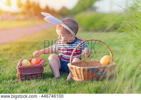 Toddler Eggs Hunters Close-up. Children Activity For Easter In Nature.