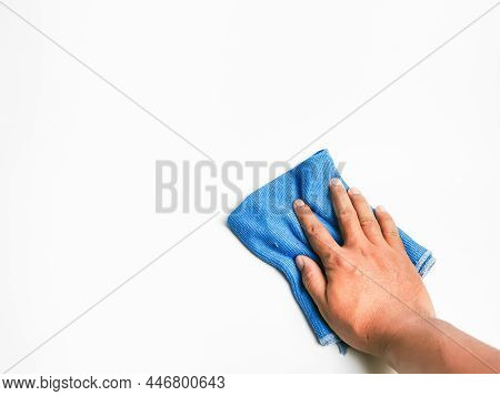 Hand Holding Blue Microfiber Cleaning Cloth On White Sufrace.