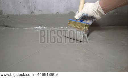 The Process Of Applying Mortar - Waterproofing To A Concrete Floor. The Concept Of Waterproofing The