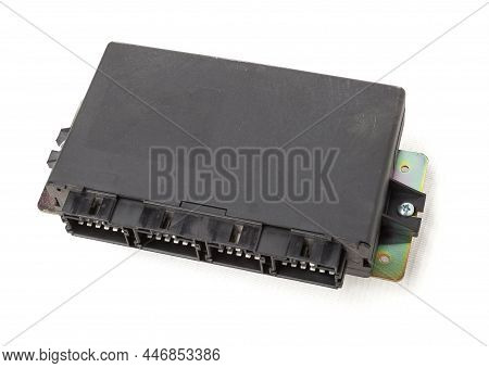 Plastic Car Engine Control Unit With Plastic Elements On A White Isolated Background Is Connecting C