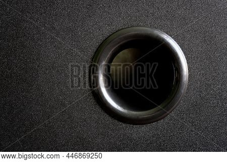 Subwoofer Bass Reflex Hole Built Into The Black Wooden Case Of The Audio Speaker. Close-up