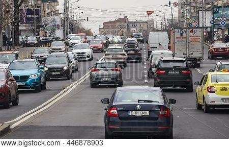 Bucharest, Romania - January 13, 2022: Cars In Traffic At Rush Hour On A Boulevard Near \