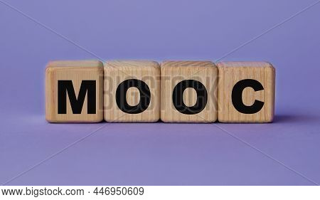 Mooc (massive Open Online Course) - Acronym On Wooden Cubes On A Lilac Background