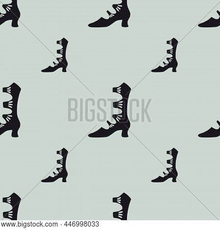 Seamless Pattern In Minimalistic Style With Black Women Boots Elements. Light Blue Background.