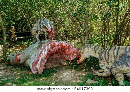 Model Of Two Raptors Eating Pray
