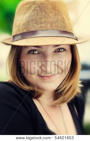 Closeup Portrait Of Beautiful Blonde Girl In Hat Is Smiling