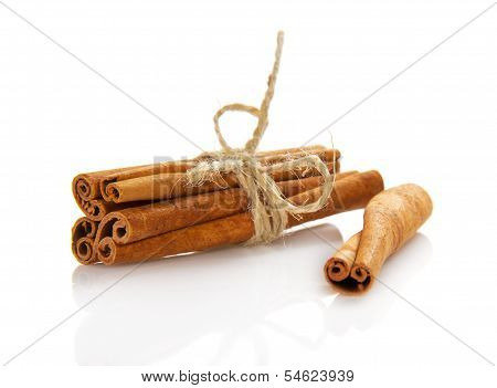 Cinnamon sticks connected by a rope