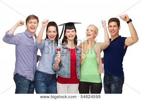 education and people concept - group of standing smiling students with diploma and corner-cap