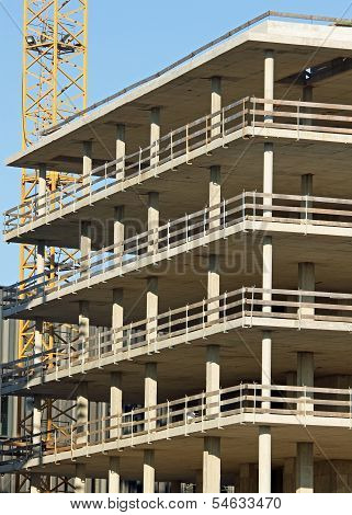 Skyscraper Under Construction In A Large Building Site