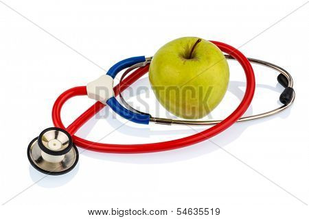 an apple and a stethoscope on a doctor. symbolic photo for healthy and vitamin-rich diet.