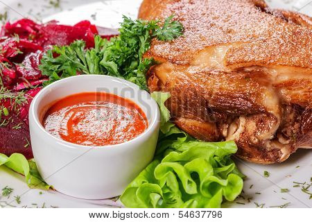 Big Piece Meat With Sauce And Vegetables