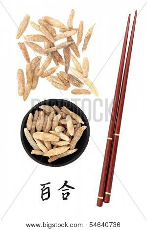 Lilyturf root chinese herbal medicine with mandarin title script translation and chopsticks. Mai dong. Ophiopogon japonicus.