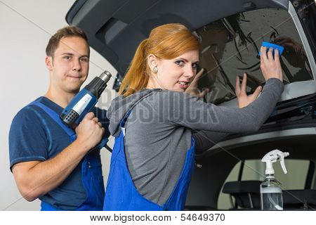 Car Wrappers Tinting A Vehicle Window With A Tinted Foil Or Film