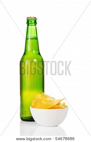 Faience bowl with chips and wet bottle of beer