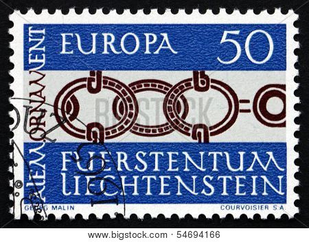 LIECHTENSTEIN - CIRCA 1965: a stamp printed in the Liechtenstein shows Alemannic Ornament, The Design is from a Belt Buckle, c. 600 A.D., Fund in a Man's Tomb near Eschen, circa 1965