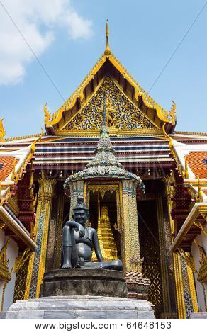 BANGKOK, THAILAND - MARCH 23: Wat Phra Kaew or Grand Palace exterior at day time on March 23, 2014 in Bangkok, Thailand. Wat Phra Kaew is the most visited travel destination in Bangkok