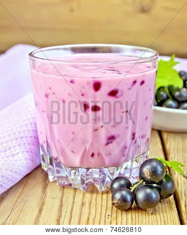 Milkshake with black currants with napkin