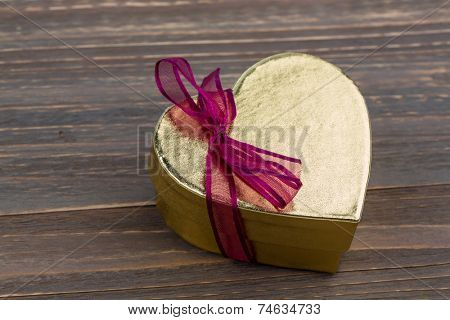 a box for a gift in the shape of a heart. symbol photo for valentine's day, wedding anniversary, engagement.