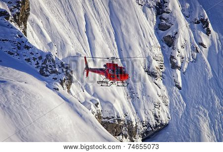 Red Helicopter In Swiss Alps Jungfrau Region