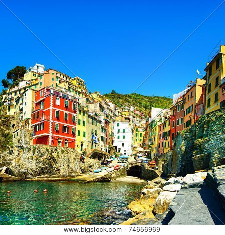 Riomaggiore Village, Rocks And Sea At Sunset. Cinque Terre, Ligury, Italy