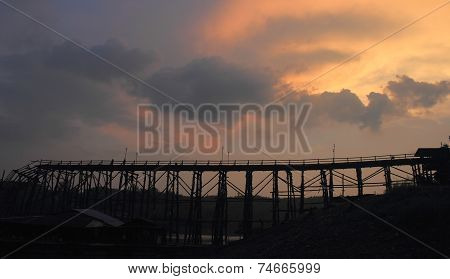 Tourist Is On Old Bridge And The Sunlight Fall