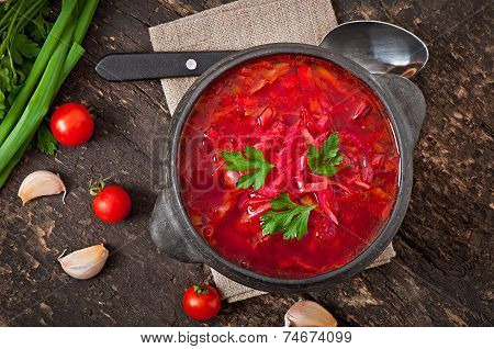 Traditional Ukrainian Russian vegetable borsch on the old wooden background